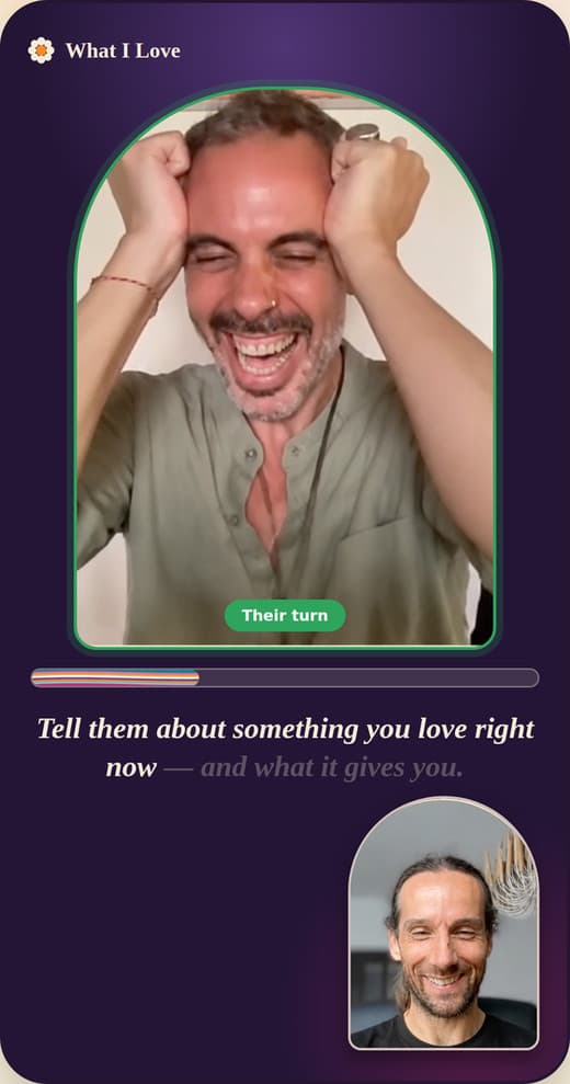 A player laughing with his hands on his head during the What I Love game
